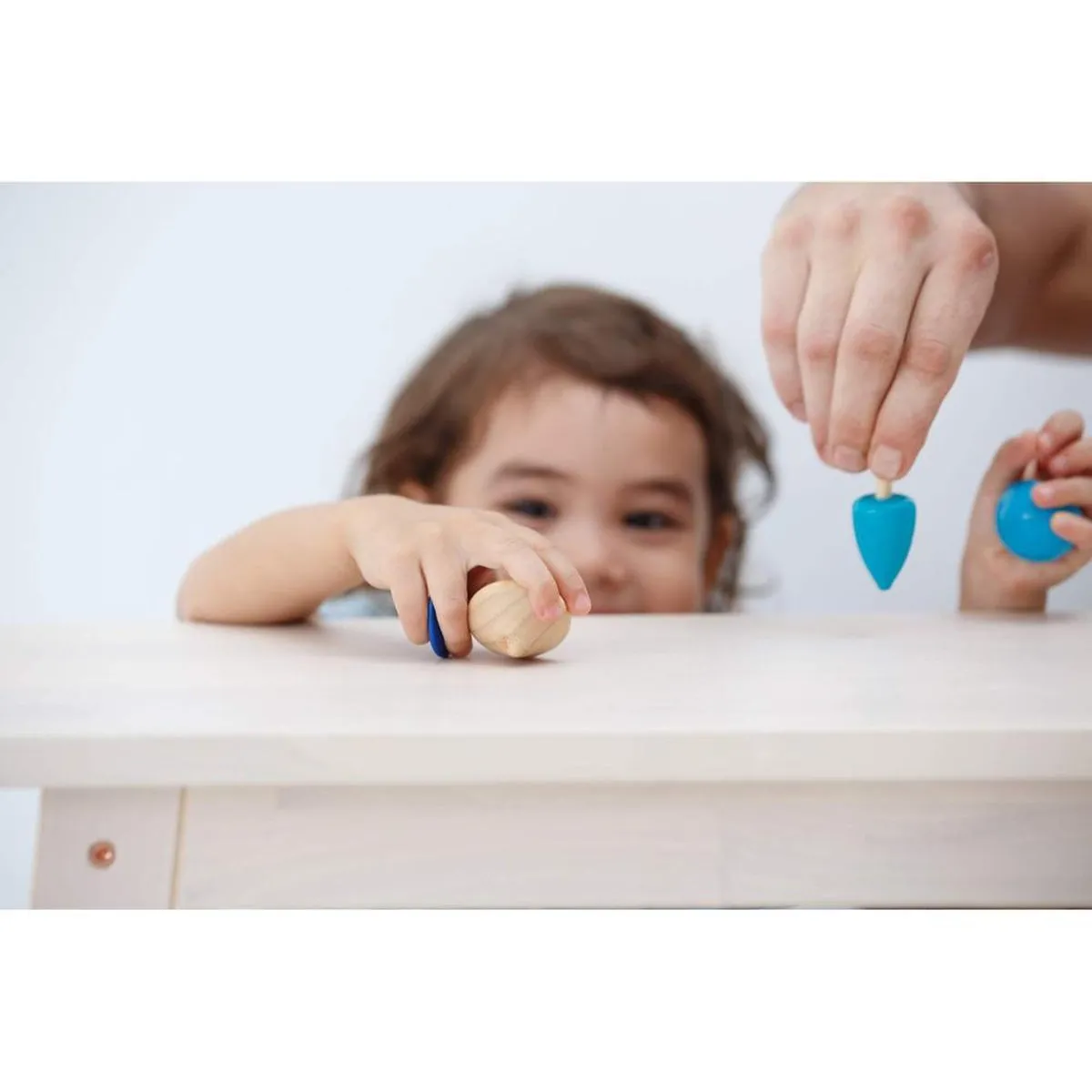 Plan Toys mini spinning tops set